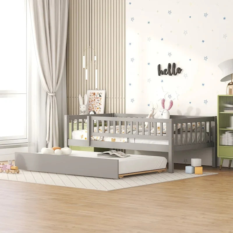 Letto a giorno in legno di dimensioni singole con letto estraibile e sponde di protezione a staccionata