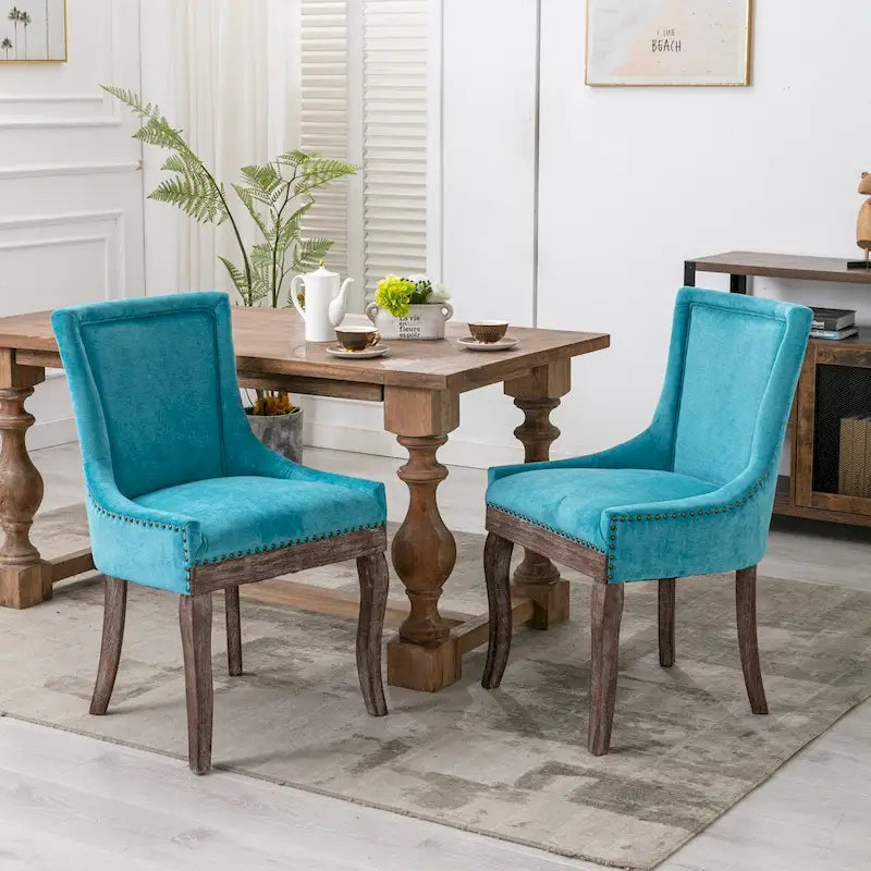 Sedia da pranzo Ultra SideSedie in tessuto ispessito con gambe in legno massello dai toni neutriTesta del chiodo color bronzoSet di 2Blu